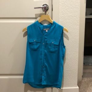 Teal silk blouse with silver buttons